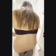 A hidden camera mounted behind a toilet records an unsuspecting girl as she takes a shit while sitting on a toilet. Poop action is clearly seen from behind her ass. Vertical format video. About 6 minutes.